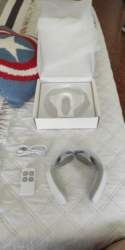 Customer photo review of Electric Wireless Smart Neck and Shoulder Massager with Pulse and Heat