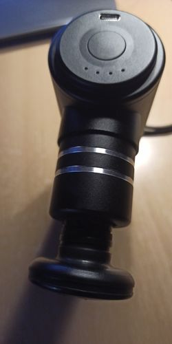 Customer photo review of BOOSTER Mini Massage Gun with 4 Heads For Muscle Relaxation