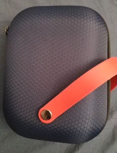 Customer photo review of BOOSTER Mini Massage Gun with 4 Heads For Muscle Relaxation