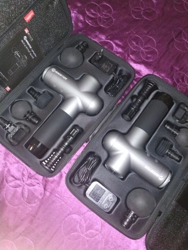 Customer photo review of BOOSTER Premium Recovery Massage Gun With 6 Massage Heads - Smart Hit Technology