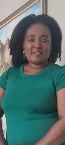 Customer photo review of Freetress Equal Drawstring Ponytail Cuban Girl 16"
