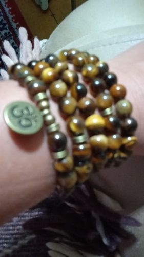 Customer photo review of Bracelet ou collier Mâlâ "OM" en Œil de Tigre
