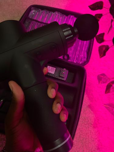 Customer photo review of LCD Display Massage Gun With Touch Screen 20 Speed & 4 Heads