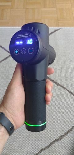 Customer photo review of LCD Display Massage Gun With Touch Screen 20 Speed & 4 Heads