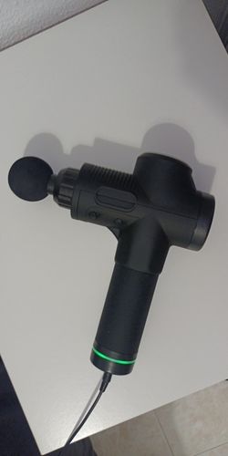 Customer photo review of LCD Display Massage Gun With Touch Screen 20 Speed & 4 Heads