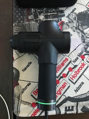 Customer photo review of LCD Display Massage Gun With Touch Screen 20 Speed & 4 Heads