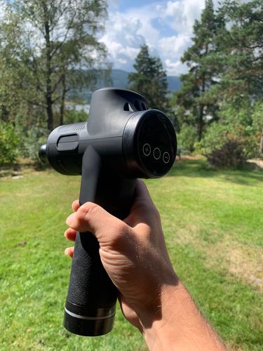 Customer photo review of LCD Display Massage Gun With Touch Screen 20 Speed & 4 Heads