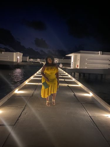 Customer photo review of Rebdolls “Ray of Sunshine” Ruffled Sleeveless Dress