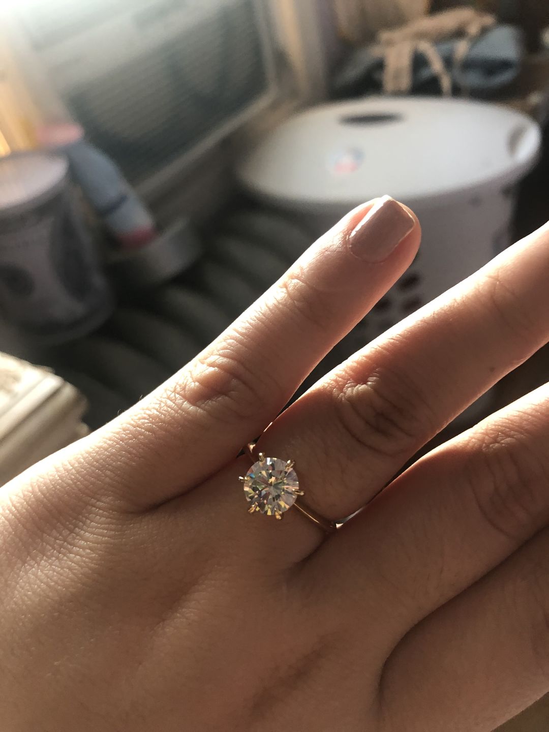 Customer photo review of S925 Moissanite/ Simulated Diamond 2.0 Carat Round Cut Solitaire Engagement Ring In Sterling Silver