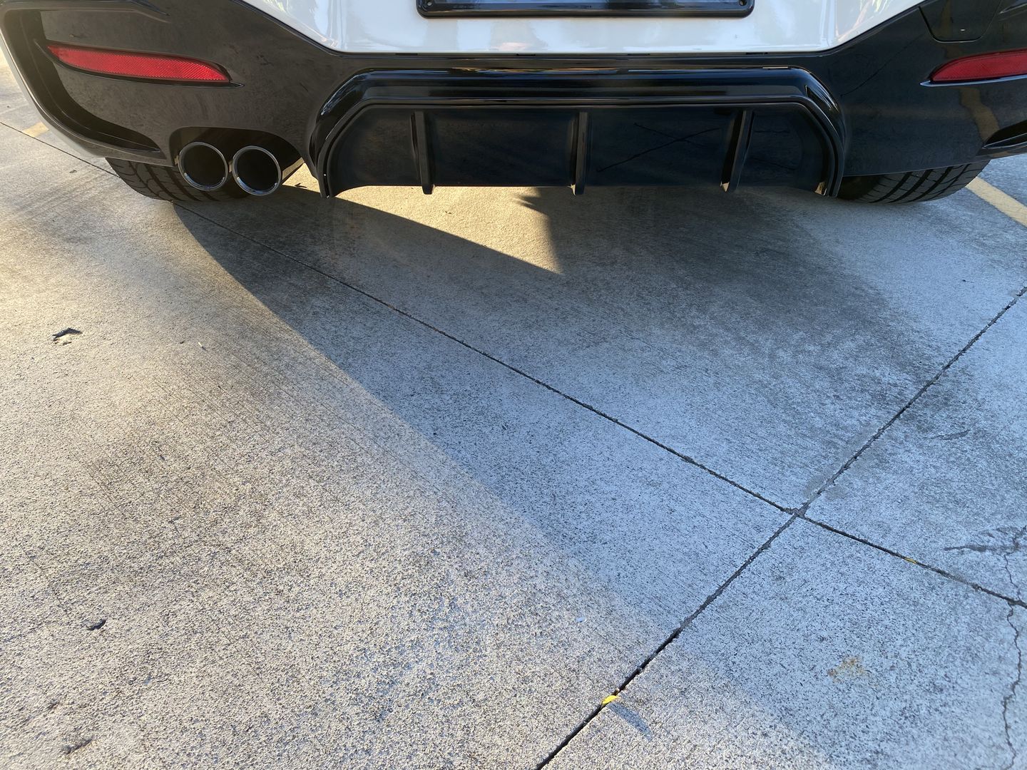 Customer photo review of ABS Glossy Black Rear Bumper Diffuser for BMW 1 Series【F20 M140/M135 & 125/120/118 M Sport】【2015-2019】LCI/LCI-2【left】