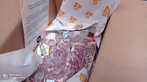 Reseña con foto de un cliente sobre Tablita de lomo