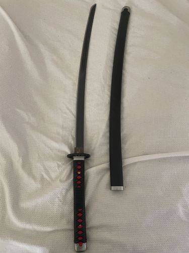 Customer photo review of DEMON SLAYER Handmade Japanese katana Samurai Swords Anime Sword Full Tang 1045 Carbon Steel Real Black Blade Sharp Collection Cospaly