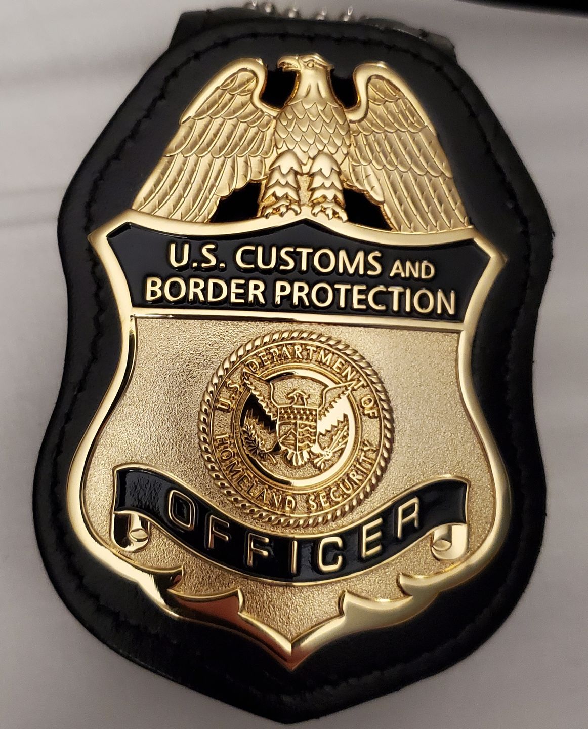 Customer photo review of US CBP Officer Customs and Border Protection Badge Solid Copper Replica Movie Props