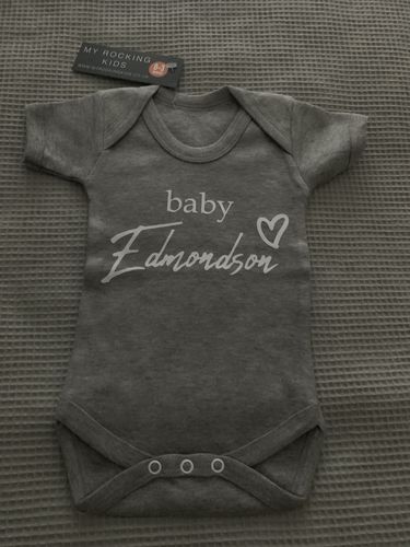 Customer photo review of Personalised Baby Surname Heart Baby Vest (MRK X)
