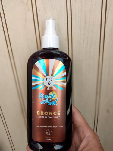 Customer photo review of Aceite Bronceador FPS 6 Rayito De Sol Bronce 220 ml