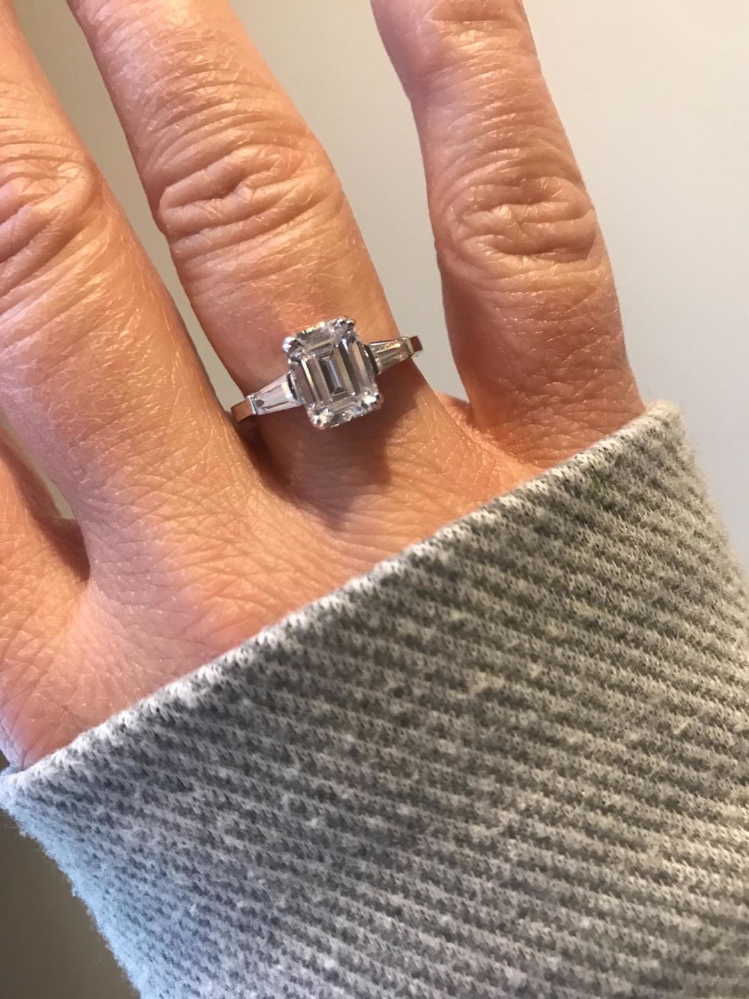 Customer photo review of Three Stone Emerald Cut Moissanite Tapered Baguette Engagement Ring