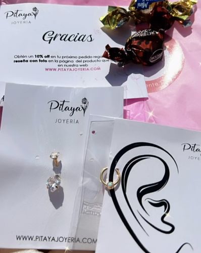 Customer photo review of Piercing Ombligo de Corazón Doble