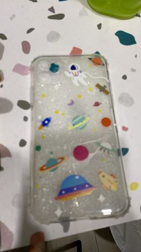 Customer photo review of Cartoon Transparent Planet iPhone Case