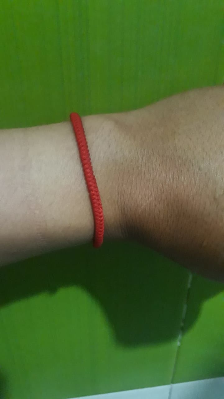 Customer photo review of Brazaletes Tibetanos Rojo x 2