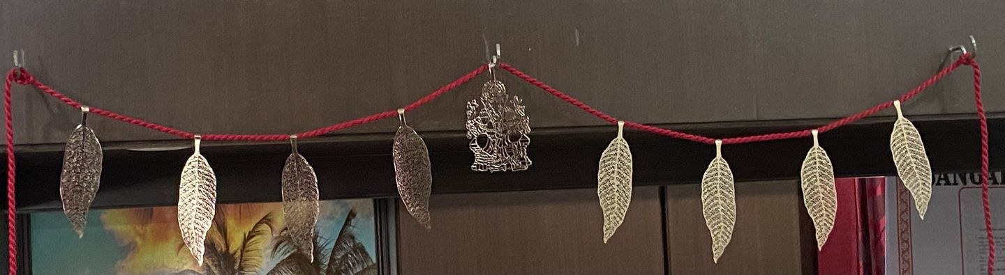 Customer photo review of Decorative Door Hanging Leaf Brass