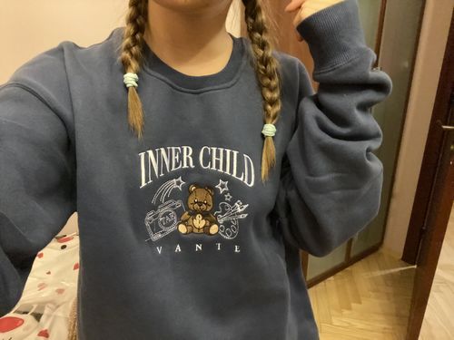 Customer photo review of Inner Child Crewneck Sweater