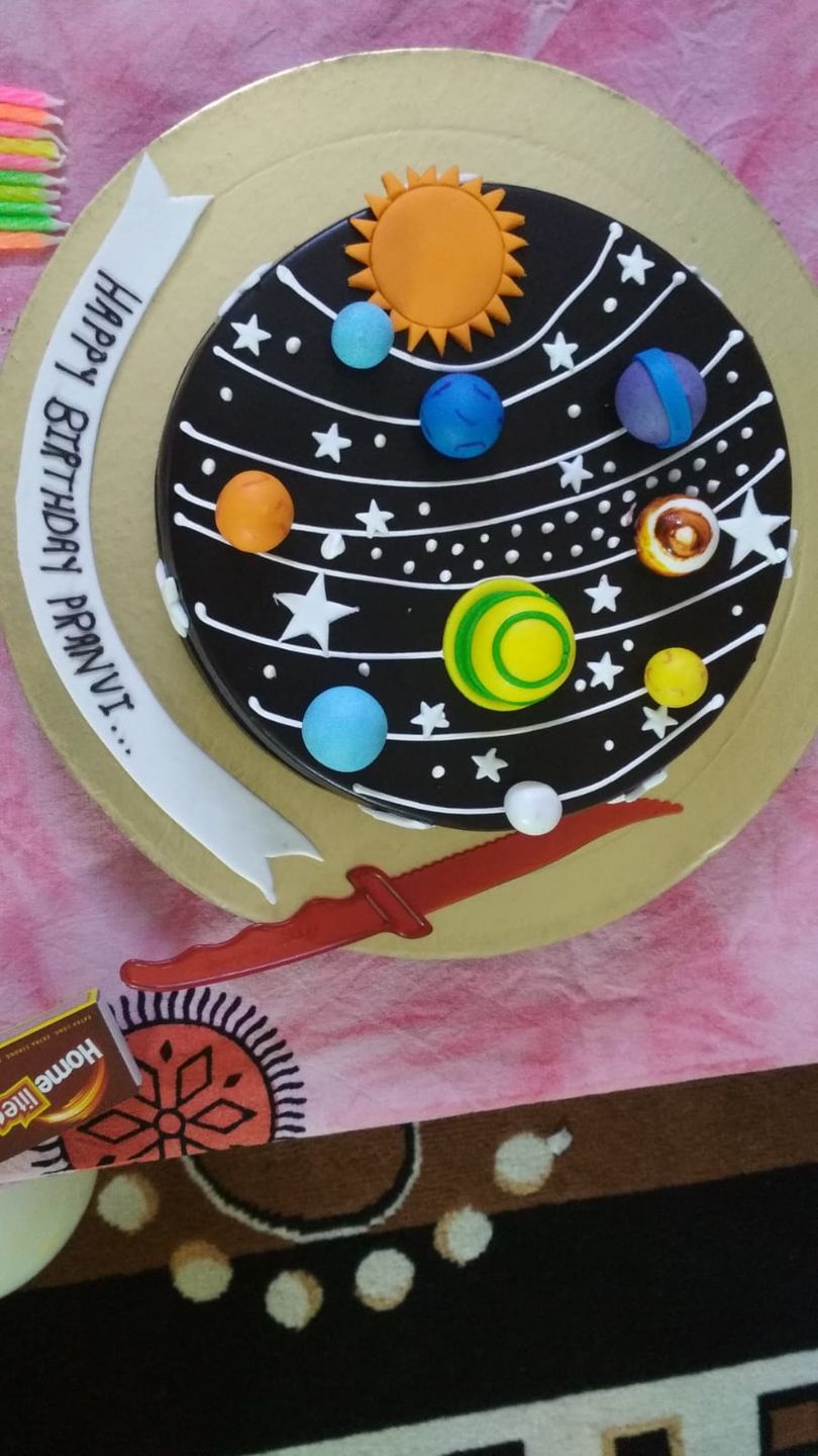 Customer photo review of Solar System Theme Cake
