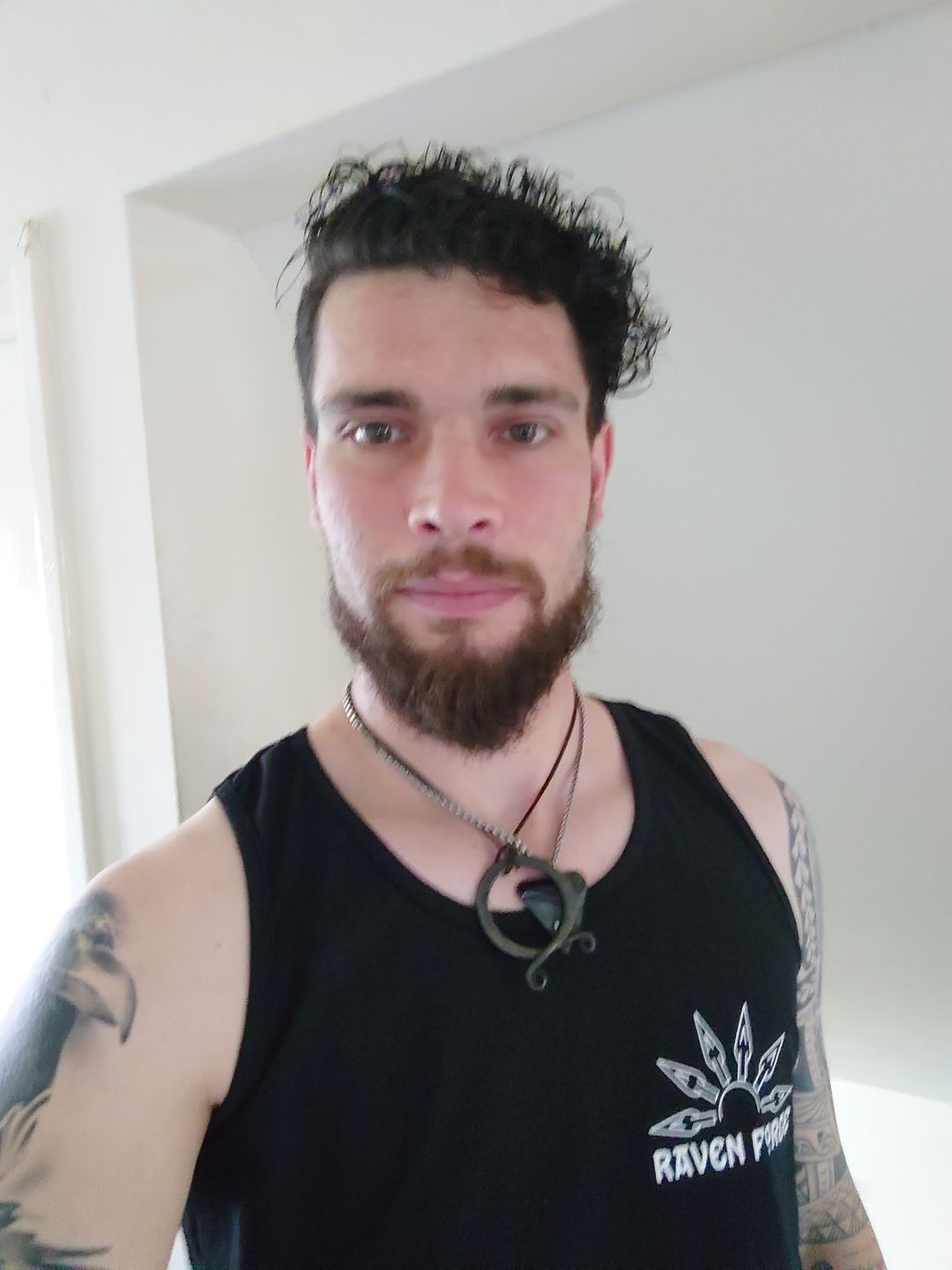 Customer photo review of Troll Cross Pendants