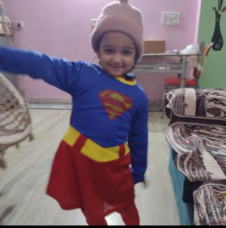 Customer photo review of Supergirl Dress with Cape and Stocking