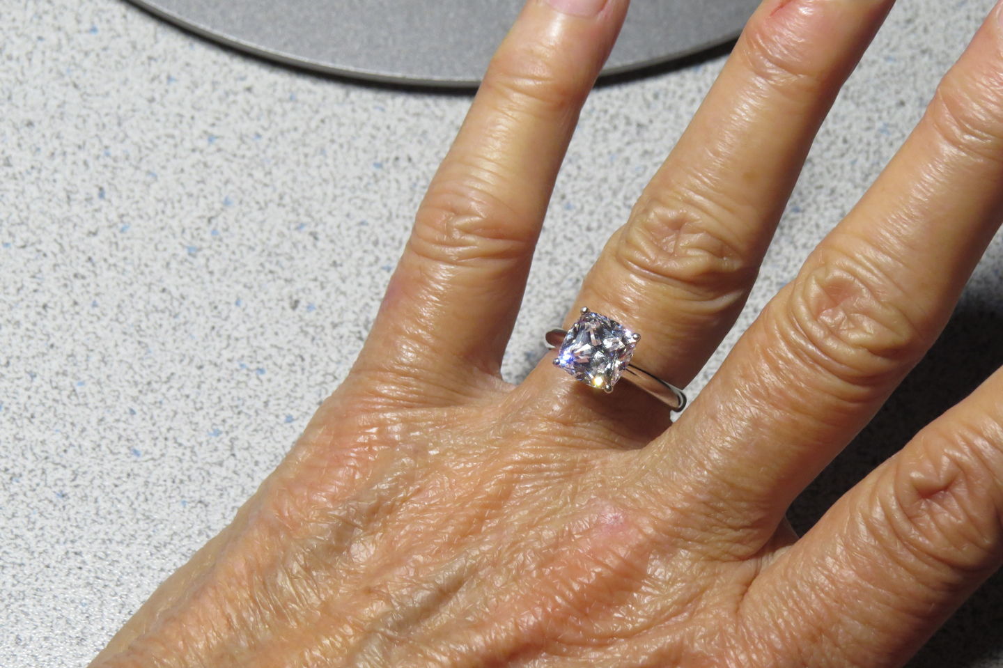Customer photo review of Classic Solitaire Princess Cut sona diamond sterling silver ring