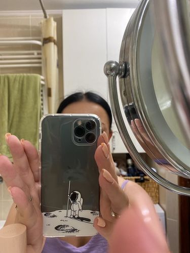 Customer photo review of Cute Cartoon Astronaut Planet iPhone Case