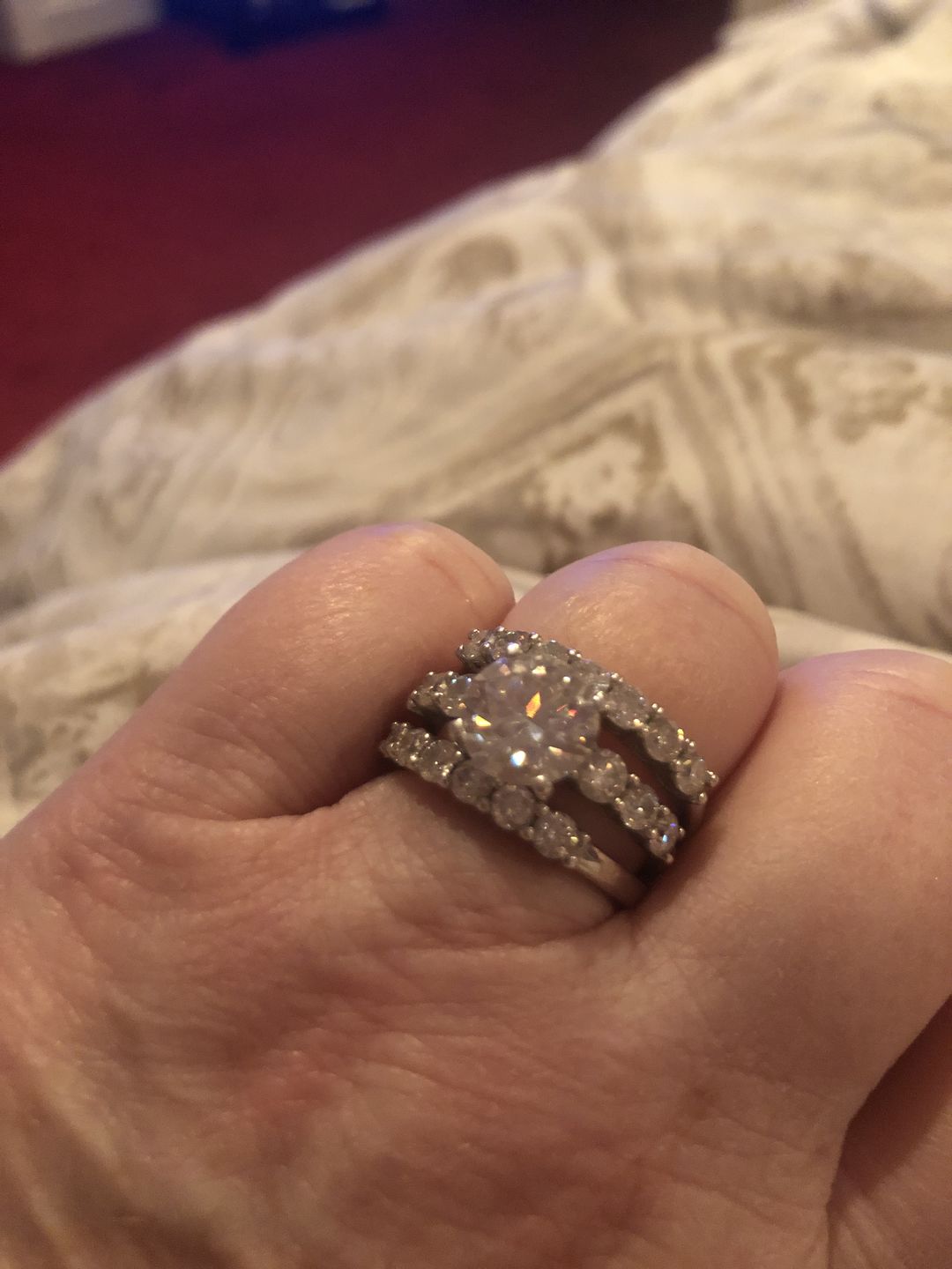Customer photo review of Round Moissanite Sterling Silver Wedding Band Stackable Ring