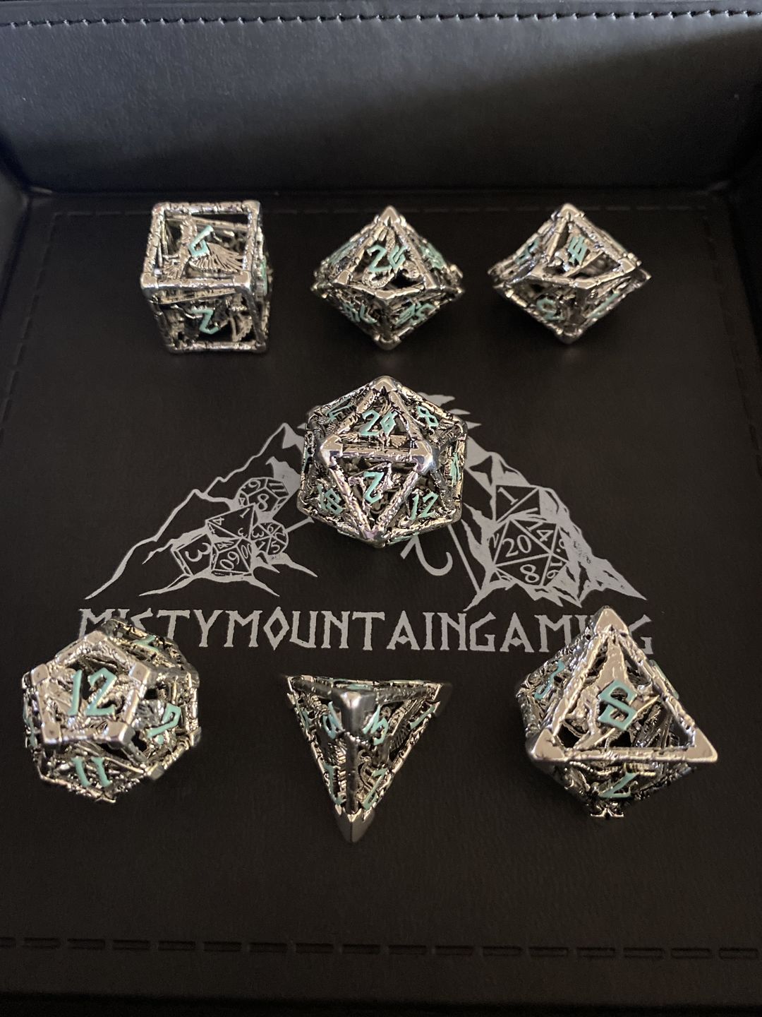 Customer photo review of LEGENDS OF VALHALLA METAL DICE - SILVER AND BLUE