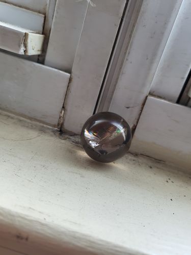 Customer photo review of High Quality Smokey Quartz Sphere with Rainbows