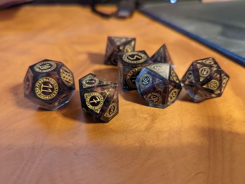 Customer photo review of URWizards Dnd Resin Octarine Glitter Engraved Dice Set Nordic Style
