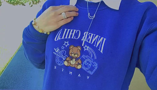 Customer photo review of Inner Child Crewneck Sweater