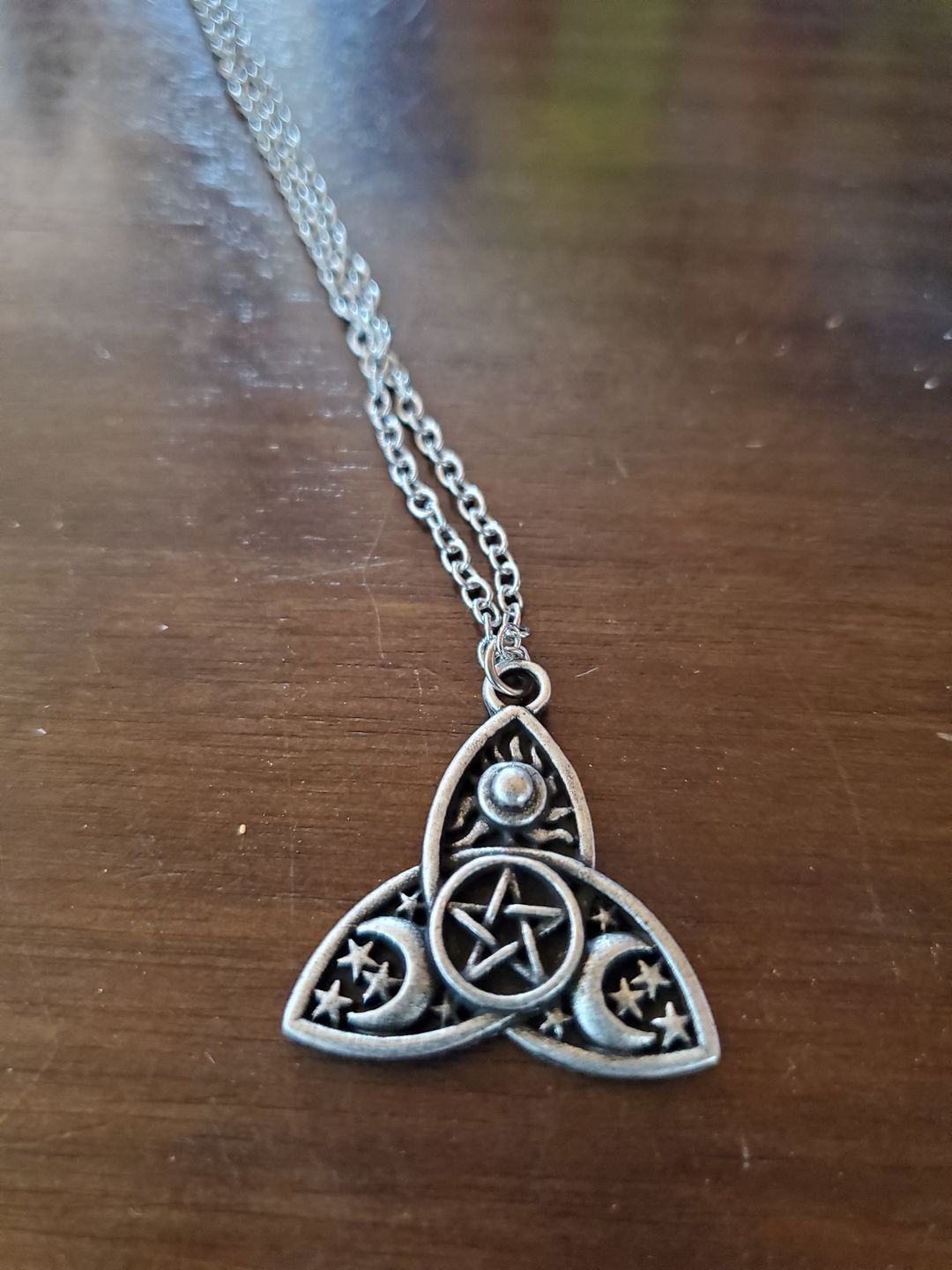 Customer photo review of Triple Moon Goddess Triquetra Necklace