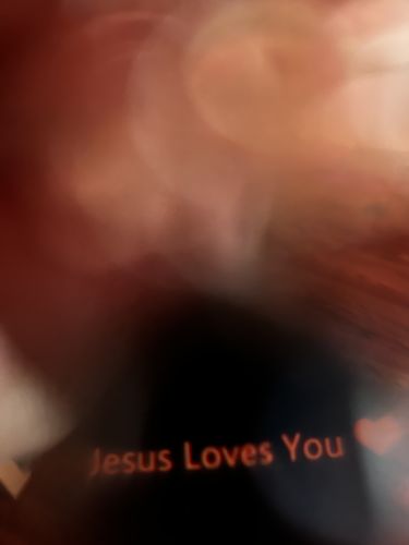 Customer photo review of Jesus Loves You Pendant