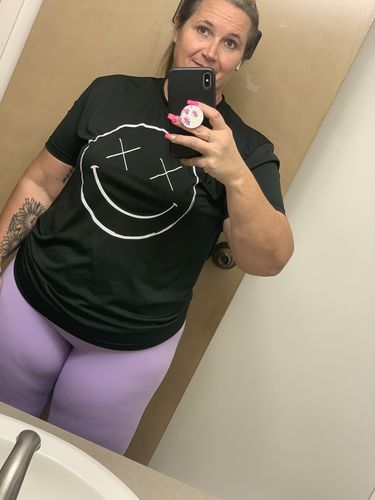 Customer photo review of Salty Savage™ Smile Performance Tee | Black