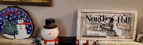 Customer photo review of Vintage Farmhouse Christmas North Pole Express Train Rides Sign