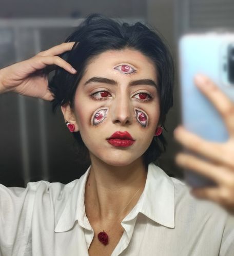 Customer photo review of EYEVOS Gridding Red Colored Contact Lenses