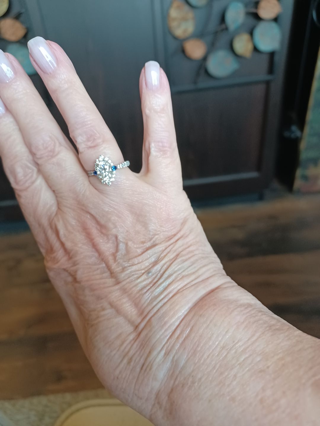 Customer photo review of Halo Oval Moissanite Pear Sapphire Sidestone Pave Engagement Ring