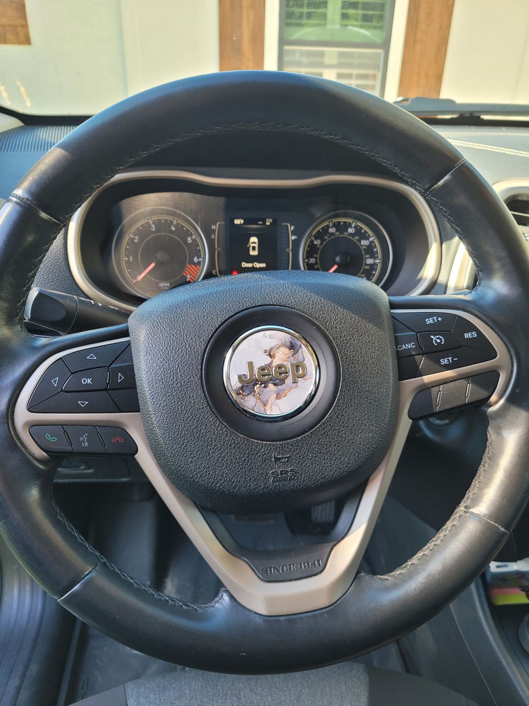 Customer photo review of Marble Print Steering Wheel Decal for Jeep vehicles