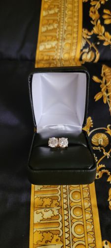 Customer photo review of VVS Moissanite Solitaire Stud Earrings