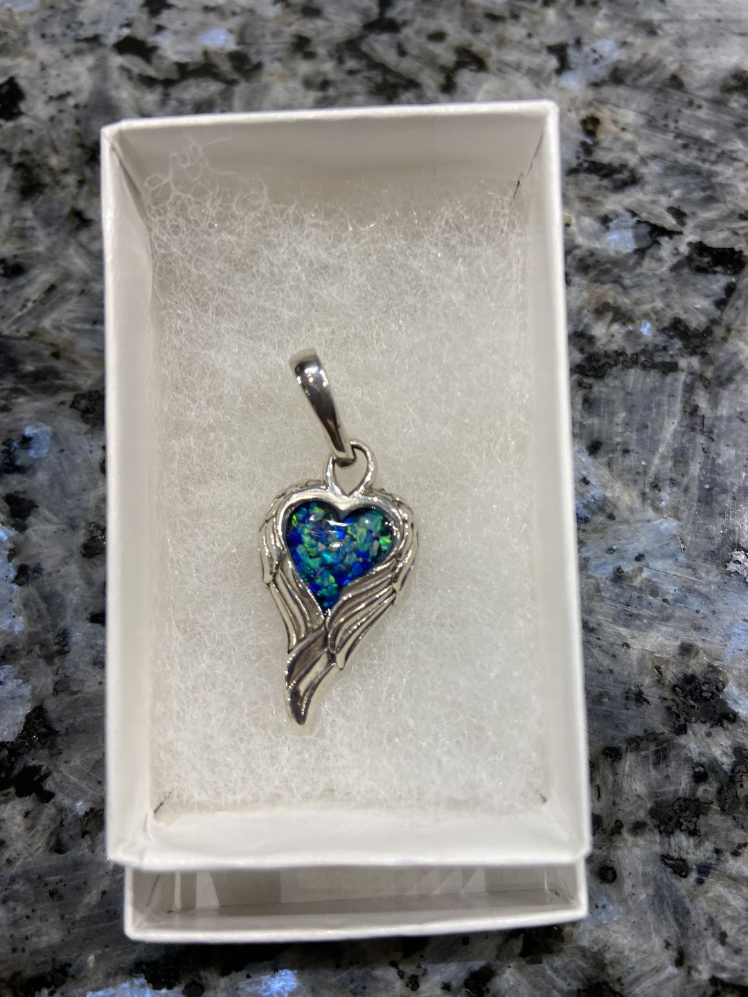 Customer photo review of Petite Angel Wing Pendant - Engravable