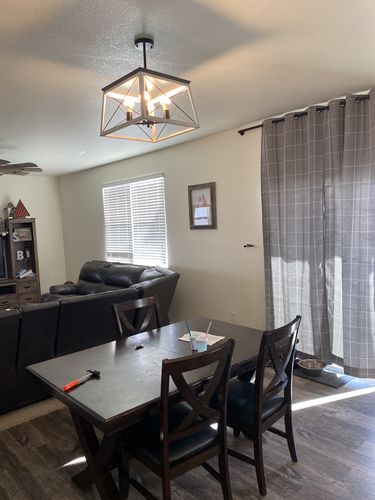 Customer photo review of Farmhouse Trapezoid Hanging 4 Light Chandelier