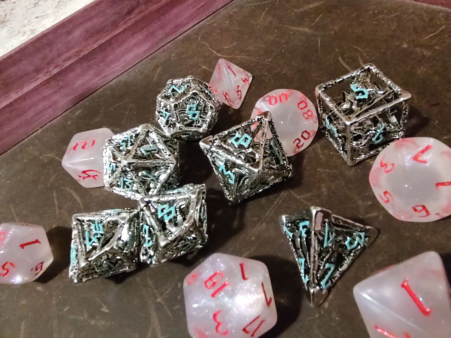 Customer photo review of LEGENDS OF VALHALLA METAL DICE - SILVER AND BLUE