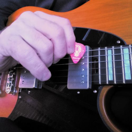 Customer photo review of Donner 48 Pack Celluloid Guitar Picks, Includes Thin, Medium, Heavy & Extra Heavy Gauges for Bass Electric Acoustic Guitars