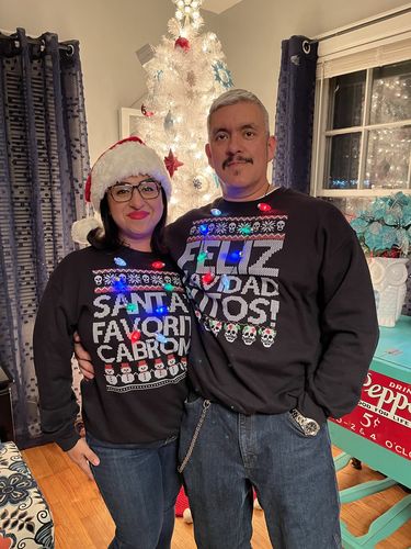 Customer photo review of Santa's Favorite Cabrona OG Navidad Sweatshirt