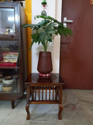 Customer photo review of Mango Wood Walnut Finish Handmade Carving Classic Side Table for Living Room (Brown)