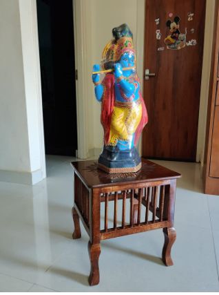 Customer photo review of Mango Wood Walnut Finish Handmade Carving Classic Side Table for Living Room (Brown)